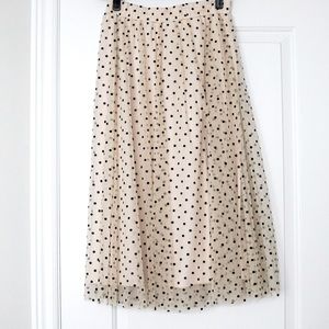 HM Cream Tulle skirt with black velvet polka dots. Excellent condition.